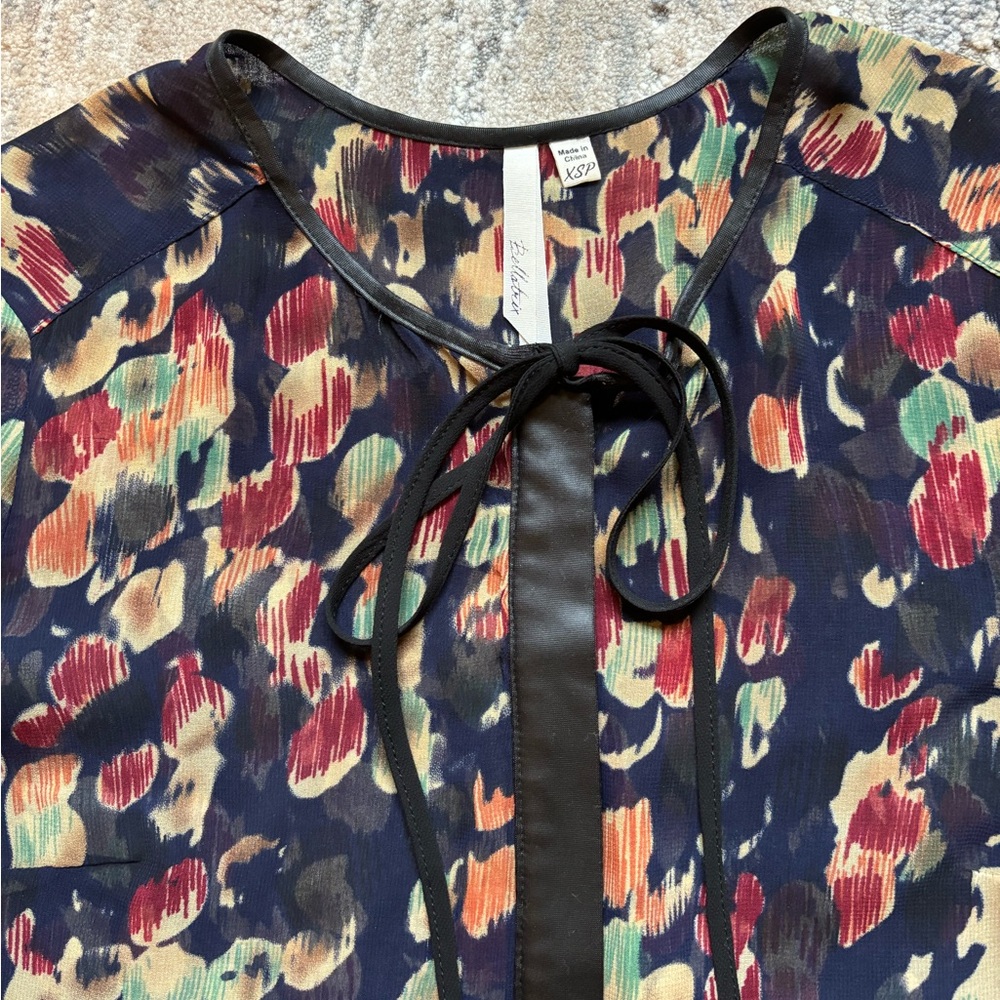 Bellatrix patterned button down blouse w/black tie and button cover detail XSP